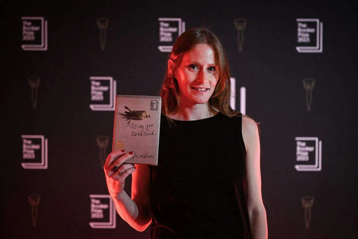Canadian author Sarah Bernstein with her book "Study of Obedience" at the National Portrait Gallery in London in September.   