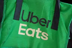 Uber Technologies on Monday said it launched pilot food delivery services with autonomous vehicles in 2 California cities, and said it was adding electric vehicle charging stations into its global driver app. 