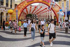 Chinese tourists walking through Senado Square in Macau, Oct 3, 2023.