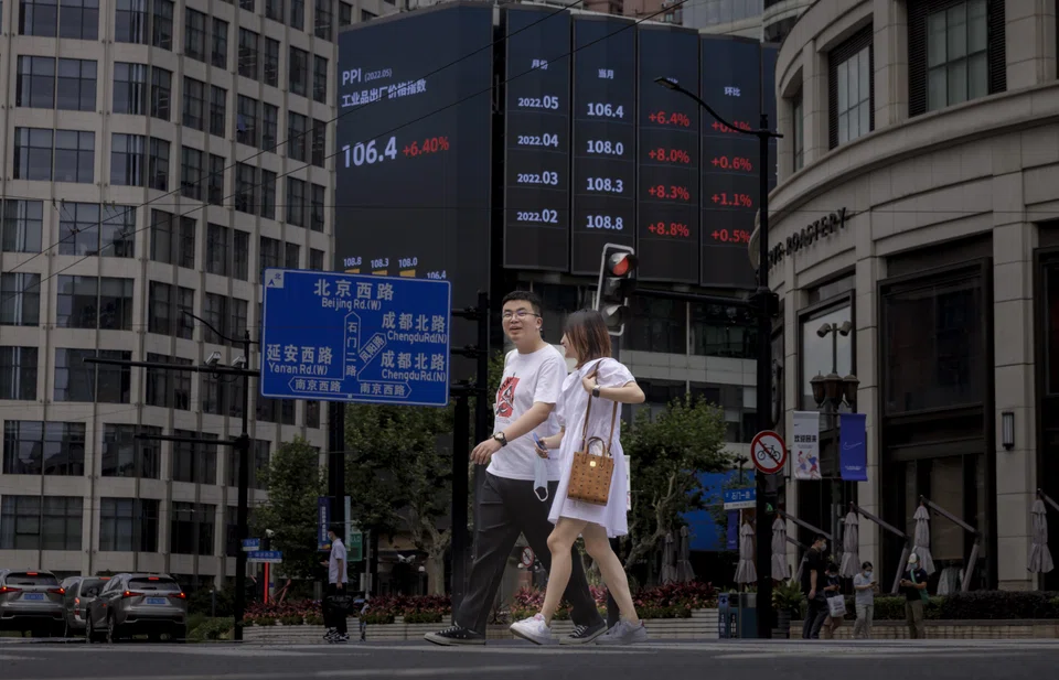 A jumbo screen showing the latest economy and stock exchange updates in Shanghai. Among equities, the worst performers this year are stocks tied to consumer spending, reflecting concerns over the fragility of the consumption-led recovery. 