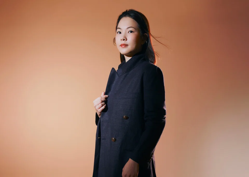 Sara Ang wears a shirt and double-breasted suit by Loro Piana.
