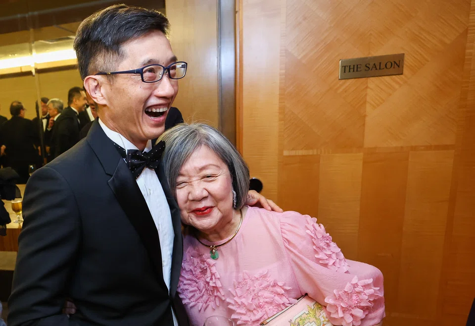 Teo Ser Luck, president of the Institute of Singapore Chartered Accountants with Jennie Chua, deputy chairman of SPH Reit.