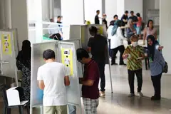 Long queues had formed at some polling stations even before voting started at 8 am on Friday.