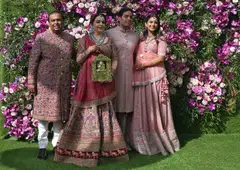 (L-R) Mukesh Ambani, the Chairman of Reliance Industries, his wife Nita Ambani, their son Akash Ambani and daughter Isha Piramal pose during a photo opportunity at the wedding ceremony of Akash, at Bandra-Kurla Complex in Mumbai, India, March 9, 2019. 