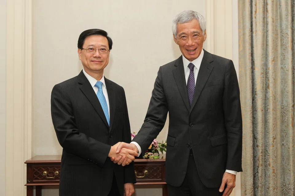 “Hong Kong is home to one of the largest overseas Singaporean communities, which reflects our close people-to-people ties,” said PM Lee (right) after meeting Hong Kong leader John Lee.