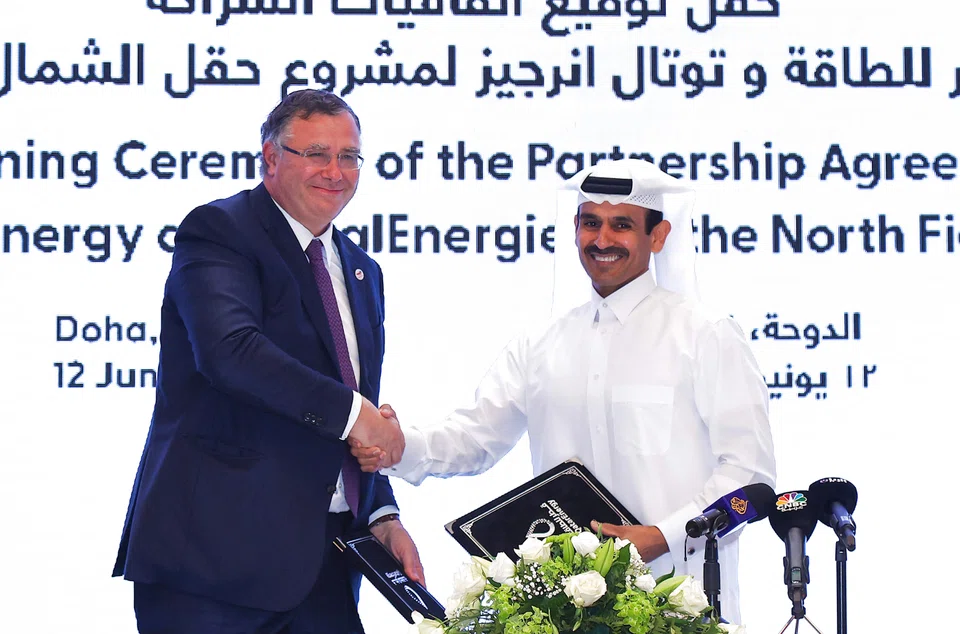 Kaabi (right) and Pouyanne at a signing ceremony at the Qatar Energy headquarters; Qatar Energy has started drilling development wells for the North Field East project. It chose Chiyoda of Japan and London-based TechnipFMC to do the main construction work.