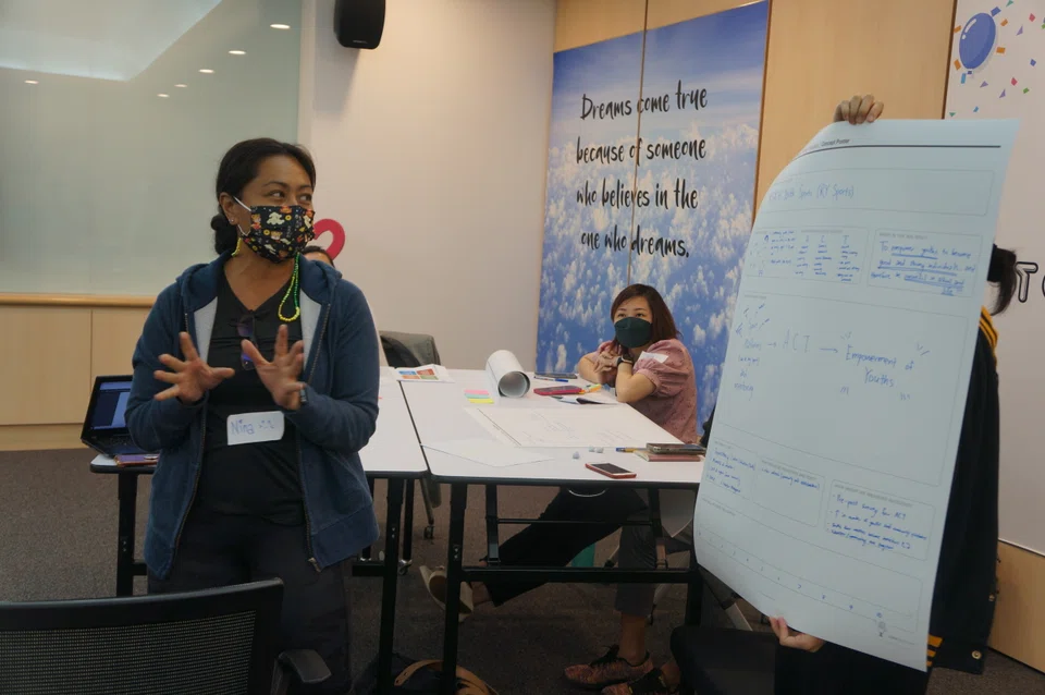 Reach Community Services Society social worker Nina Catrina (left) says the Level Up workshop allows participants to gather feedback from their peers.