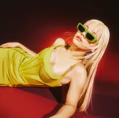 Sorn in Versace dress and Gentle Monster sunglasses.