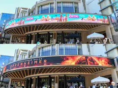 (COMBO) This combination of pictures created on December 10, 2023 shows Grove's Theater marquee announcing the opening of "Barbie" and "Oppenheimer" movies in Los Angeles California, on July 20, 2023. "Barbie" and "Oppenheimer" -- the unlikely pair of films that dominated the box office and spawned countless internet memes this summer -- are expected to lead the newly revamped Golden Globes when nominations are unveiled December 11.
Collectively dubbed "Barbenheimer" after their theatrical releases happened to fall on the same date, both movies are likely to score highly with voters for the Globes, which kick off Hollywood's film award season. (Photo by VALERIE MACON / AFP) / XGTY