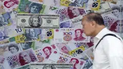Authorities in Asia are squaring off with traders who bet that regional currencies will continue to slide as more aggressive Federal Reserve tightening boosts the dollar. 