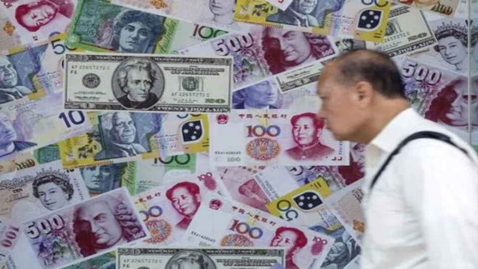 Authorities in Asia are squaring off with traders who bet that regional currencies will continue to slide as more aggressive Federal Reserve tightening boosts the dollar. 
