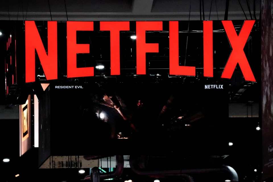 FILE PHOTO: Signage at the Netflix booth is seen on the convention floor at Comic-Con International in San Diego, California, U.S., July 21, 2022. REUTERS/Bing Guan/File Photo