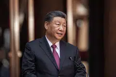 The Chinese president is under pressure to assure executives that his nation is very much open for business and making progress in its efforts to revive the economy.
