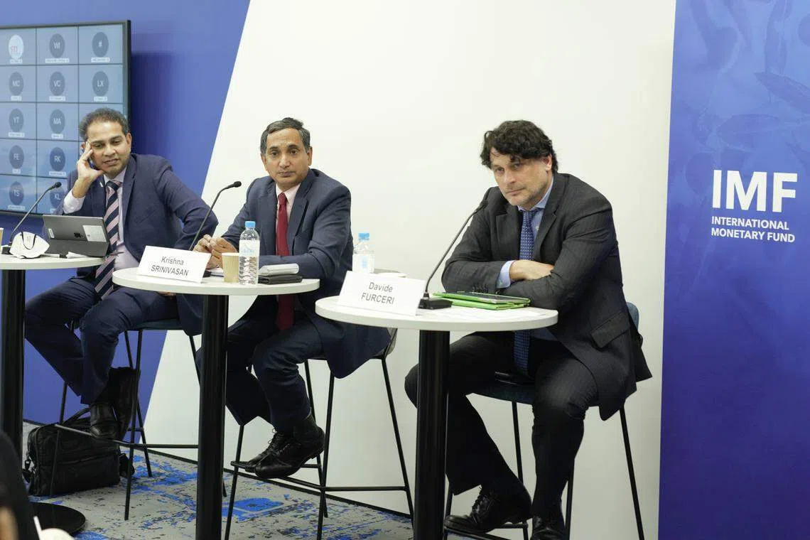 Krishna Srinivasan, Director, Asia Pacific Department at IMF (centre) says the size and persistence of spillovers on the region 's GDP depend on the type of shock confronting China.