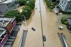 Typhoon Doksuri has caused flooding in Fuzhou; officials have upgraded their emergency response order to level two for Beijing and Tianjin, and the provinces of Hebei, Shanxi and Henan on Sunday.
