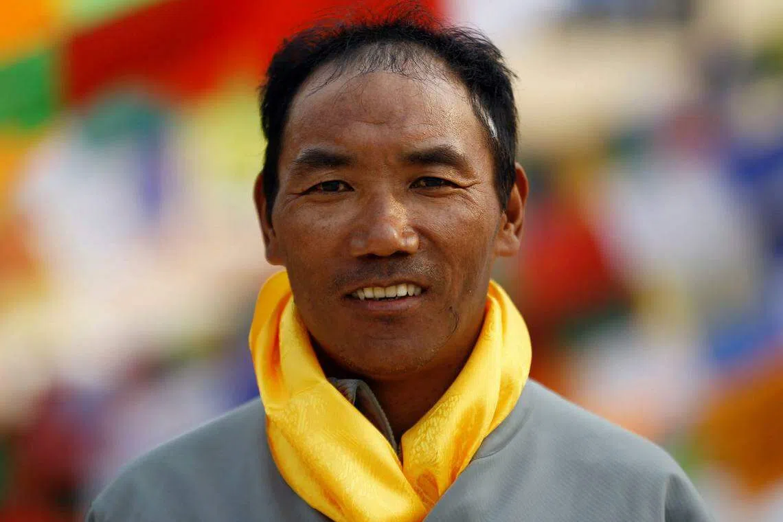 Two Sherpa climbers set new summit records on Everest
