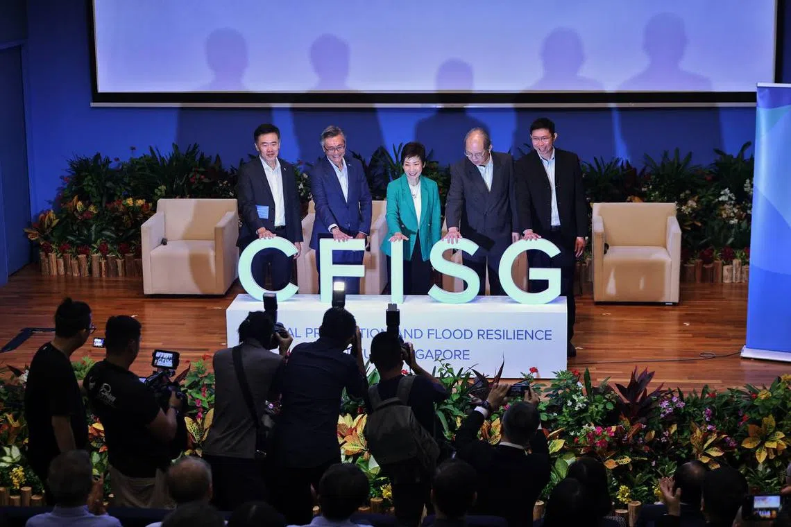 (From left) CFISG executive director Prof Richard Liew, NUS president Prof Tan Eng Chye; Minister for Sustainability and the Environment Grace Fu, PUB chairman Chiang Chie Foo and PUB chief executive Goh Si Hou launch the Coastal Protection and Flood Resilience Institute Singapore.