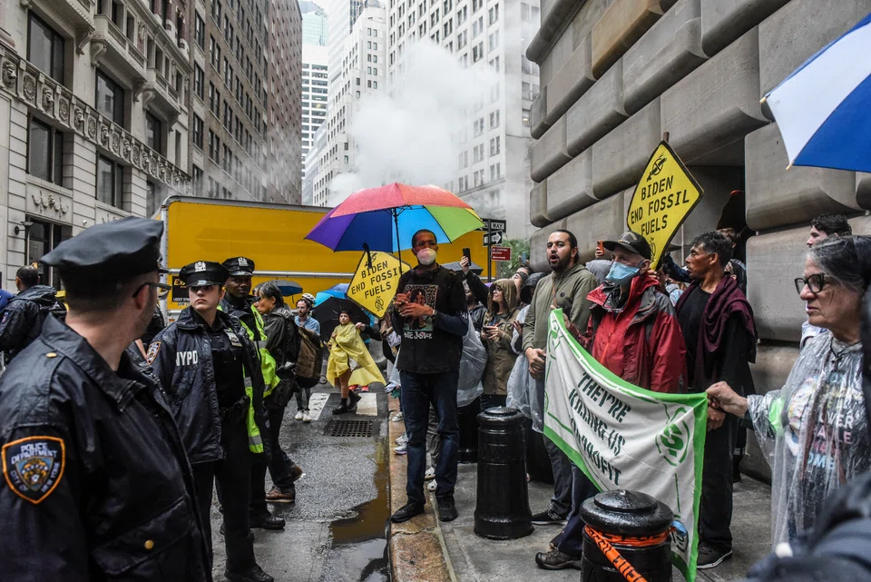 A climate protest in the Financial District of Manhattan, on Sept. 18, 2023. Several major firms have retreated from a global climate coalition, Climate Action 100+.
