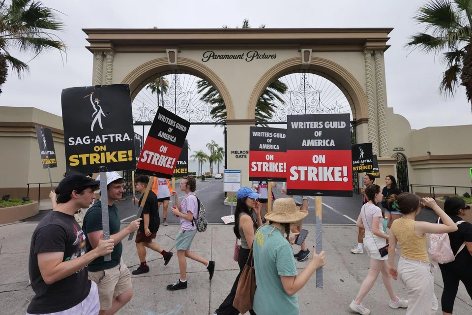 Writers Guild of America and Screen Actors Guild members and supporters on a picket line outside Paramount Studios in Los Angeles, California. 