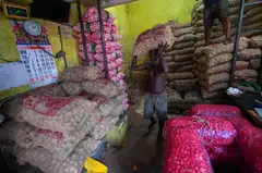 Sri Lanka’s agriculture sector grew 2.6 per cent from a year earlier, but industrial output shrank by 9.2 per cent, while services decreased by 0.2 per cent.