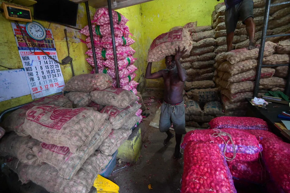 Sri Lanka’s agriculture sector grew 2.6 per cent from a year earlier, but industrial output shrank by 9.2 per cent, while services decreased by 0.2 per cent.