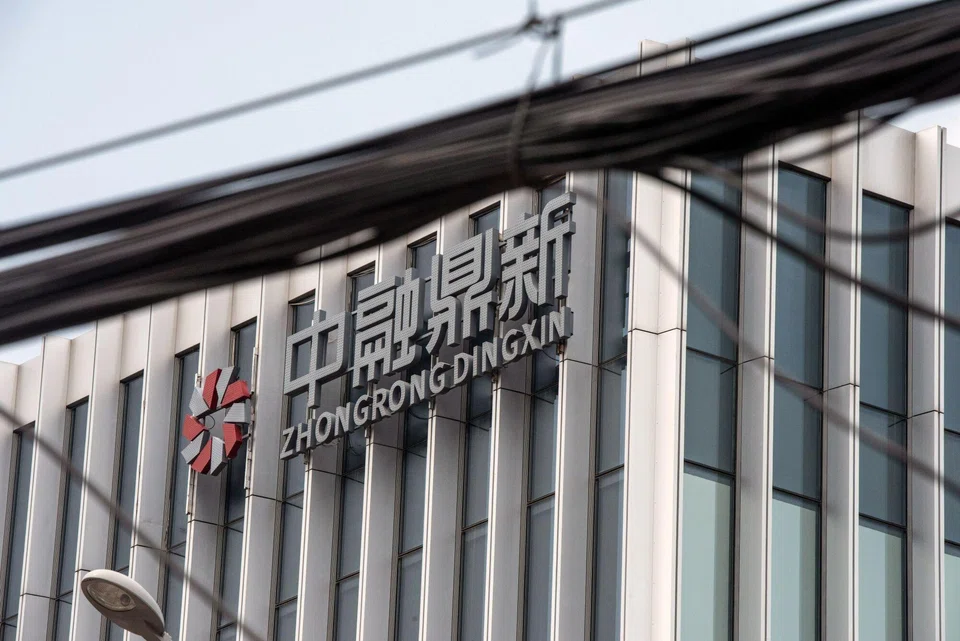 Zhongrong has missed payments on at least 22 products since Jul 28, with an outstanding value of about 160 billion yuan to 200 billion yuan and involving nearly 30,000 investors, according to the letter sent to regulators.