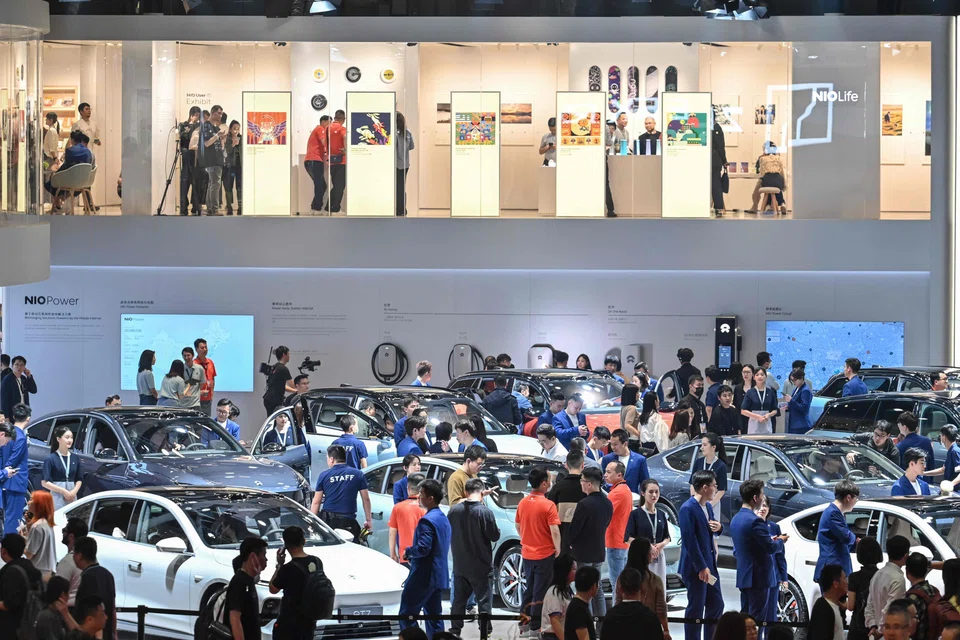 People visiting a Nio booth at the 20th Shanghai International Automobile Industry Exhibition in Shanghai in April.