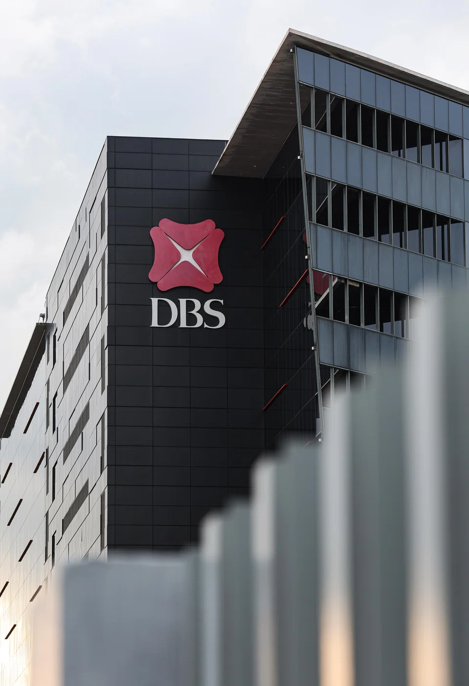 RHB has cut its target price for DBS to S$33 from S$35.70, but maintains its "neutral" call on the stock.
