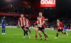 Sheffield United's Oli McBurnie (second from right, wearing No 9 on the shorts) celebrating with his teammates after netting a penalty in the 103rd minute against West Ham last weekend.