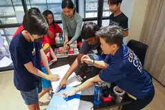 The workshops, held in person for the first time since the start of the coronavirus pandemic, use art and technology to highlight mental wellness and sustainability issues.