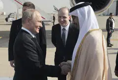 Russia's President Vladimir Putin meeting UAE Foreign Minister Sheikh Abdullah Zayed upon arrival at the airport in Abu Dhabi on Dec 6, 2023. 