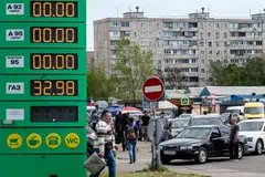 Drivers stay in line outside a petrol station as they try to buy fuel, amid Russia's invasion of Ukraine, in Kyiv, Ukraine, May 11, 2022.  