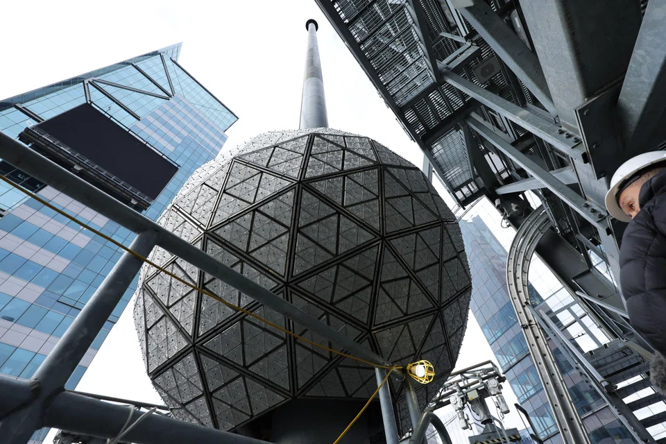 Waterford crystals are installed onto the Times Square New Year's Eve celebration ball on the roof of One Times Square on Dec 27, 2022 in New York City.