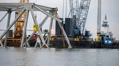 Wreckage from the Francis Scott Key Bridge will be lifted away and processed at a Baltimore shipping site before being taken to a disposal site. 