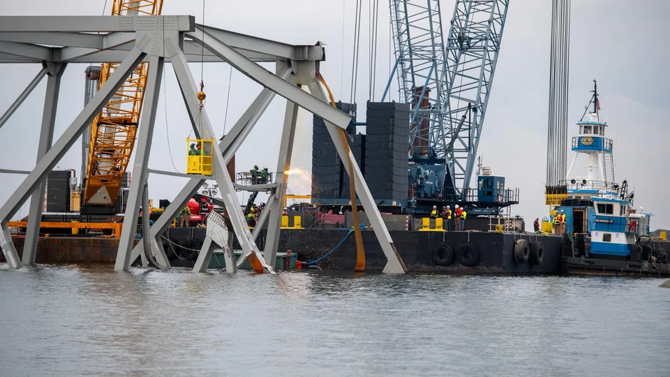 Wreckage from the Francis Scott Key Bridge will be lifted away and processed at a Baltimore shipping site before being taken to a disposal site. 