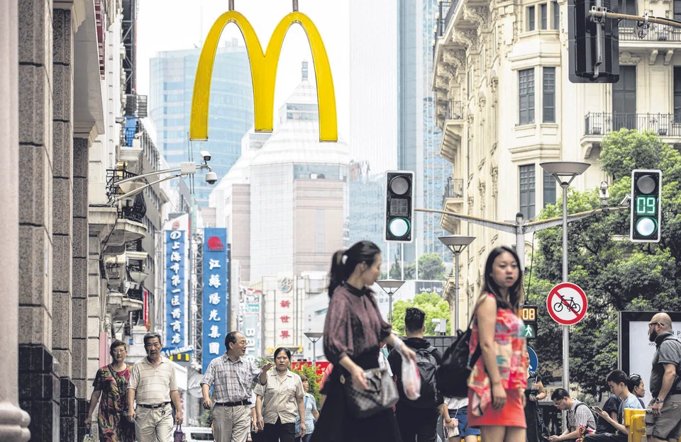 Above:The Golden Arches in Shanghai. Since 2017, the number of McDonald’s stores in China has doubled to 5,500, and the country has become the US fast-food company's second-largest market. The plan is to have more than 10,000 stores in China by 2028.