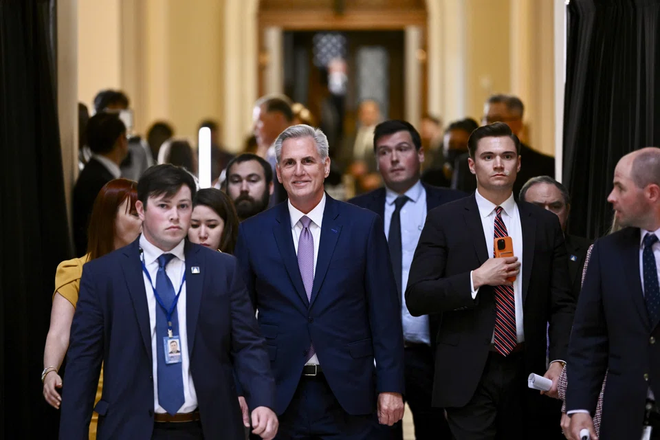 US Republican House Speaker Kevin McCarthy approaches media after the House passed the debt limit bill at the Capitol in Washington on April 26, 2023. 