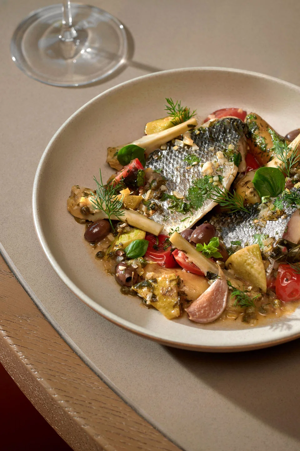 Pan-seared sea bass in lemon butter sauce