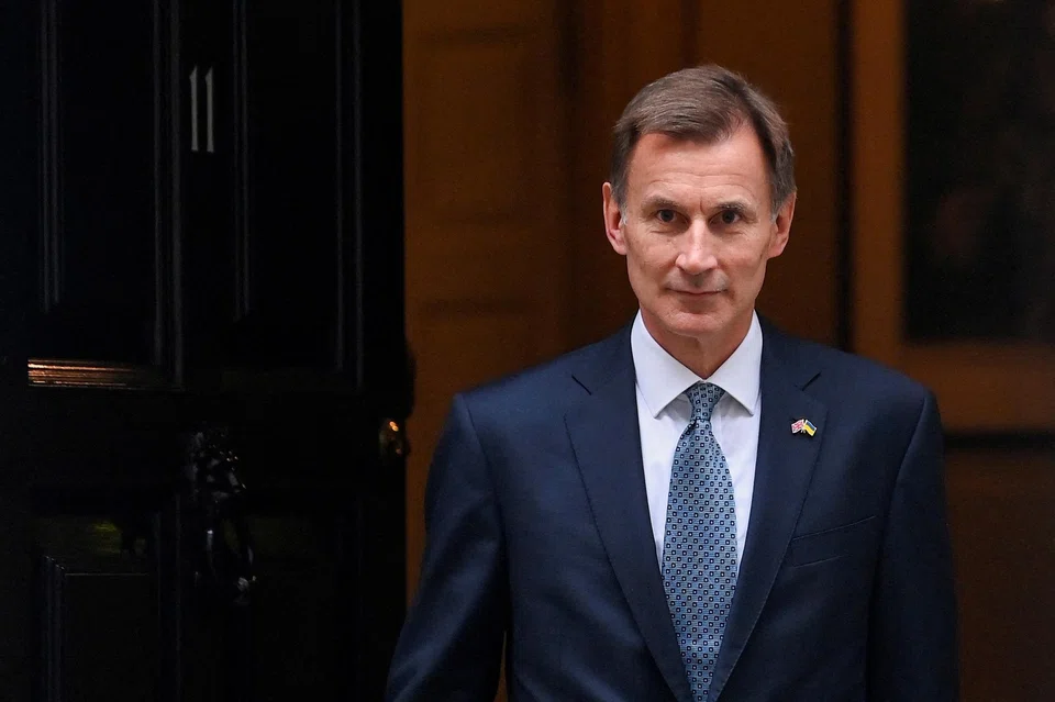 British Finance Minister Jeremy Hunt says: "I will be systematically going through all the areas where there are barriers that stop people from working who want to, so that we can help people get back to work and fill those vacancies for our businesses.” 