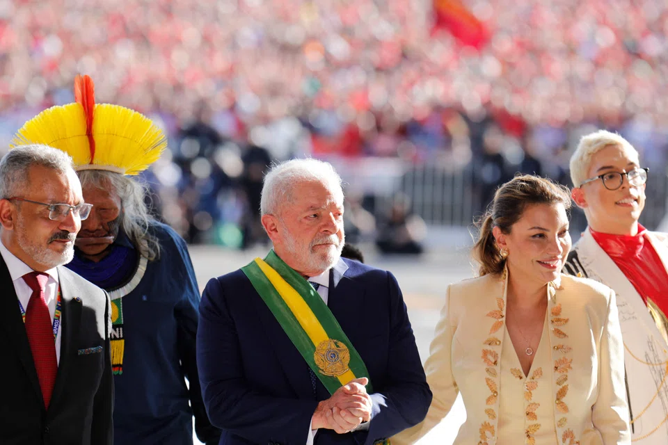 Brazil's new President Luiz Inacio Lula da Silva (centre), accompanied by his wife First Lady Rosangela "Janja" da Silva (second from right),  after his inauguration ceremony at the National Congress, in Brasilia, on Jan 1, 2023.