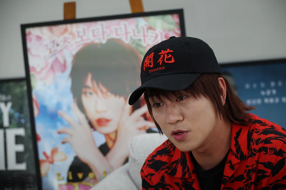 Tanaka, whose real name is Kim Kyung Wook, speaks during an interview with Reuters in Seoul, South Korea, May 16, 2023.  Young Koreans are fueling a sharp rebound in demand for Japanese culture and consumer products. 