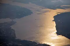 An aerial view of the Johor Strait. The overall nature disclosure rate among top Asia-Pacific listcos is 31.4 per cent, with Singapore's at 27.1 per cent, according to a study by the NUS Business School's CGS.