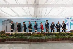 At the groundbreaking ceremony for the facility on Tuesday are (from left): Daniel Tan, executive director of Commonwealth Kokubu Logistics; Tan Boon Khai, chief executive of JTC Corporation; Png Cheong Boon, chief executive of Enterprise Singapore; Koki Hayashi, managing officer at Kokubu Japan; Andrew Kwan, group managing director of Commonwealth Capital; Low Yen Ling, Minister of State for Trade and Industry; Hitoshi Ogata, chief financial officer and director at Kajima Asia-Pacific Holdings Group;  Lim Chuan Poh, chairman of Singapore Food Agency; Yoshiaki Takahashi, deputy chief of mission at the Japan Embassy; and Peh Soon Li, chairman of Precise Development. 