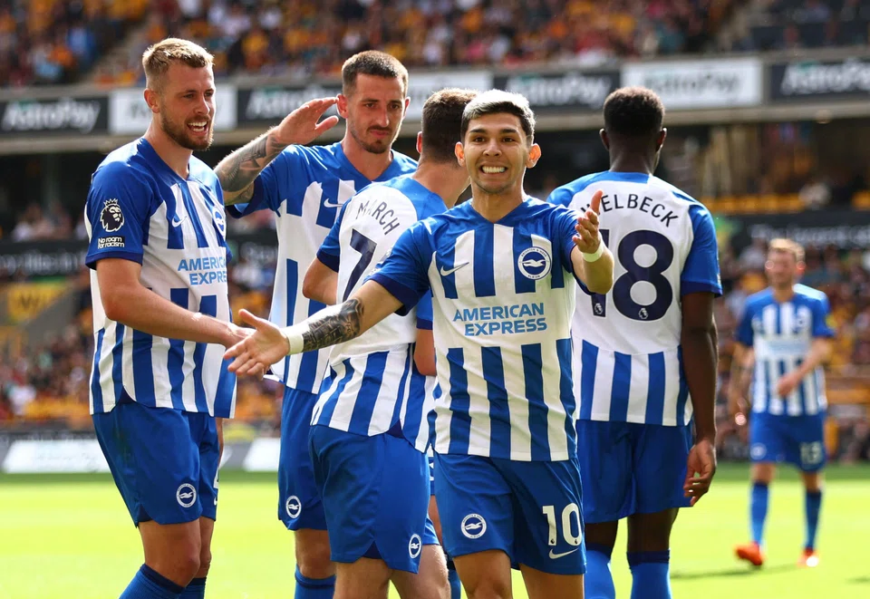 Brighton players celebrating their third goal  against Wolverhampton Wanderers last weekend. The club is one of only three teams to win their opening two fixtures in the EPL.
