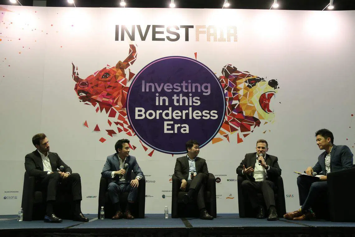Speakers (L to R) Matthew Henshaw, Marcus Ng, Jermyn Wong, Geoff Howie and Ryan Huang were speaking about investing in the STI during not so straight forward times.