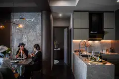 Daniel Bian, a Chinese potential property buyer from Shanghai, visits a luxury condominium in Bangkok, Thailand, April 20, 2023.