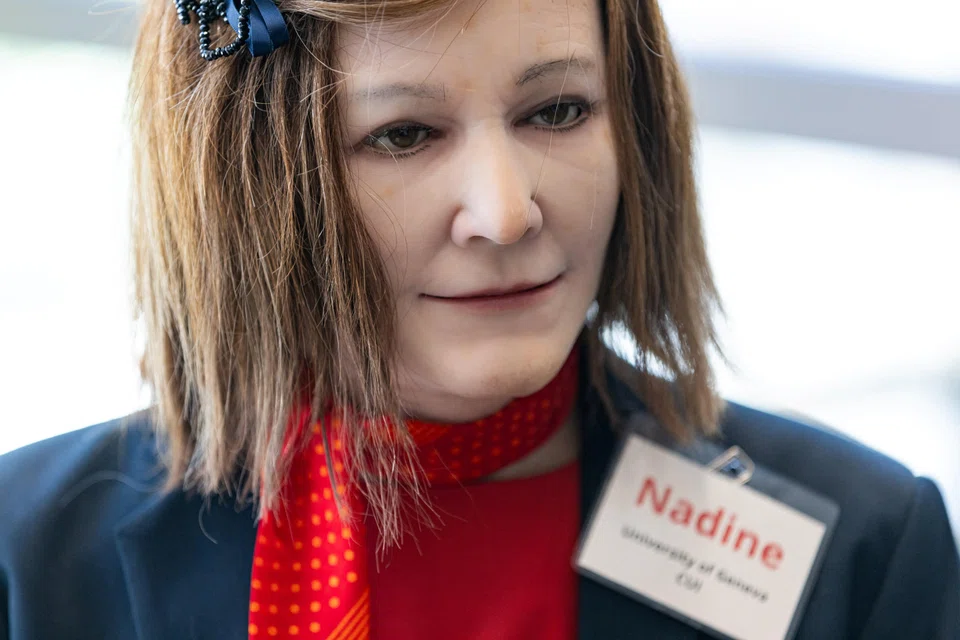Nadine (above) and robots like it could prove more effective than human carers, says Nadia Magnenat Thalmann, a robot expert.