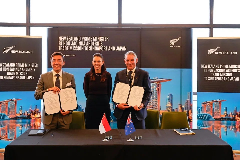 (Left to right) Enterprise Singapore Managing Director Jeffrey Siow, New Zealand Prime Minister Jacinda Ardern and New Zealand Trade and Enterprise CEO Peter Chrisp at the signing of the Enhanced Partnership for Growth Arrangement on April 20, 2022.
