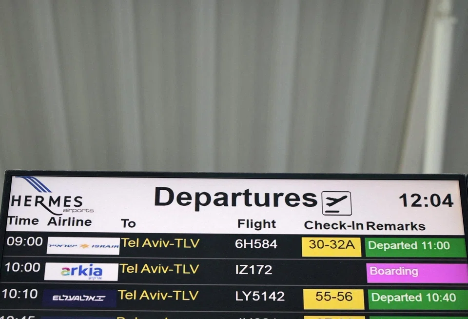 A departures board announcing flights to Tel Aviv, Israel, is seen in Larnaca International Airport, in Larnaca, Cyprus, Oct 9, 2023. 