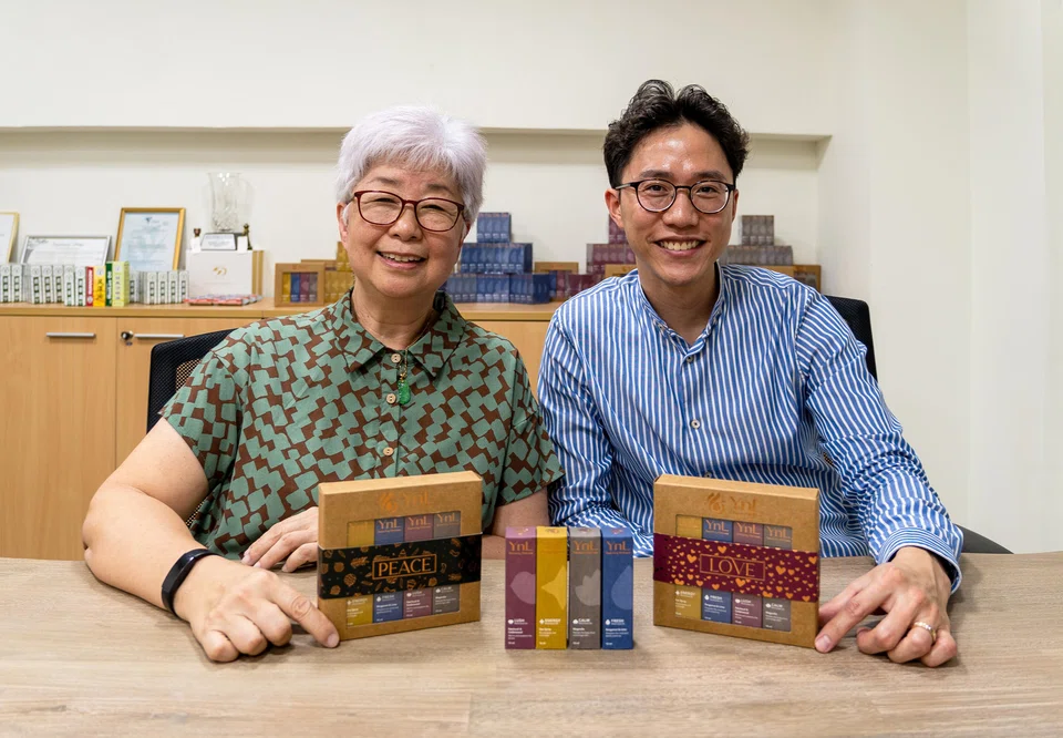 Karol Tong (left), general manager at Tai Tong Ah, with Jayden Ang, director of business development at Senses International. Both companies collaborated to develop YnL, a range of botanic aromatherapy medicated oils.